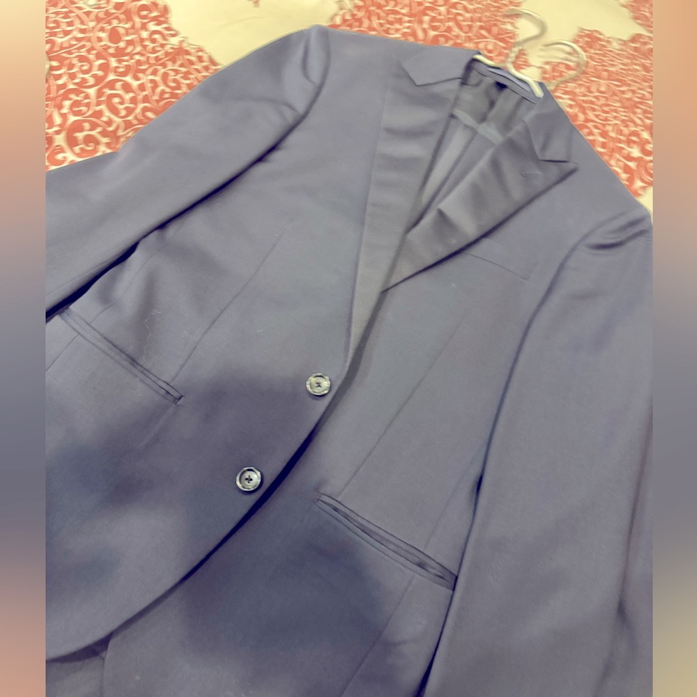 Young men’s tuxedo (fit a 13 year old )in perfect condition .Worn once .